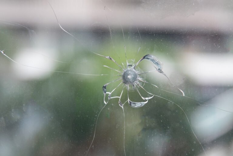Bullet hole in window