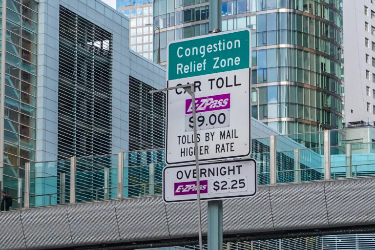 Congestion prices signage in lower manhattan at the entrance to the congestion relief zone on the first day of its implementation in new yorkcongestion prices signage in lower manhattan at the entrance to the congestion relief zone on the first day of its implementation in new york