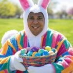 Cory Booker dressed as the Easter Bunny, delivering eggs - Political Satire - AI Rendered/.GrokAI