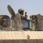IDF soldiers in tank.