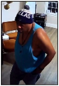 Masked burglar caught on camera in Cary Street heist