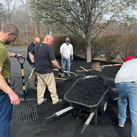 Absecon cops team up for field of dreams spring cleanup ahead of opening day