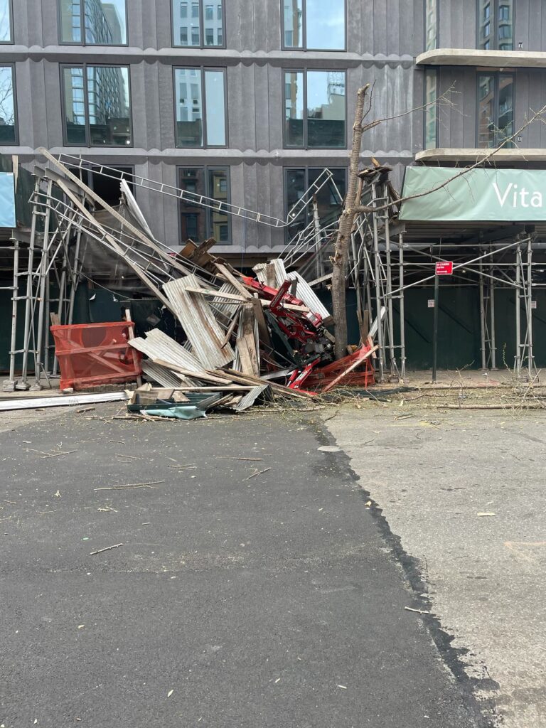 Crane crash chaos in midtown: spider crane plummets through scaffolding in new york ci ty - photo licensed by shore news network.