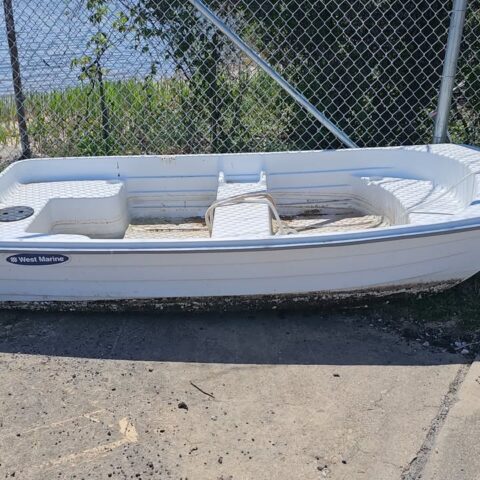 Mystery dinghy found adrift on middle river shore, maryland police seek owner - photo licensed by shore news network.