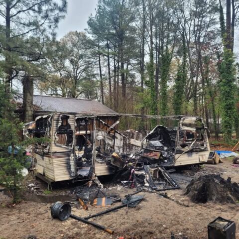 Dog saves woman from burning camper in delaware - photo licensed by shore news network.