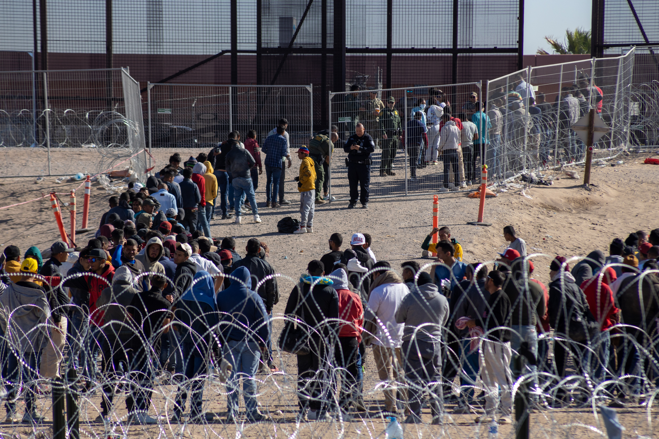 Migrants crossing U.S. border during Biden administration.