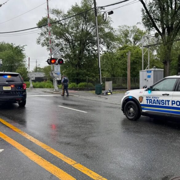 Car hit by train in new jersey flees scene missing trunk and bumper - photo licensed by shore news network.