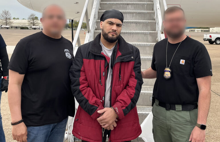 Ice removes illegal brazilian fugitive convicted of armed robbery in boston - photo licensed by shore news network.