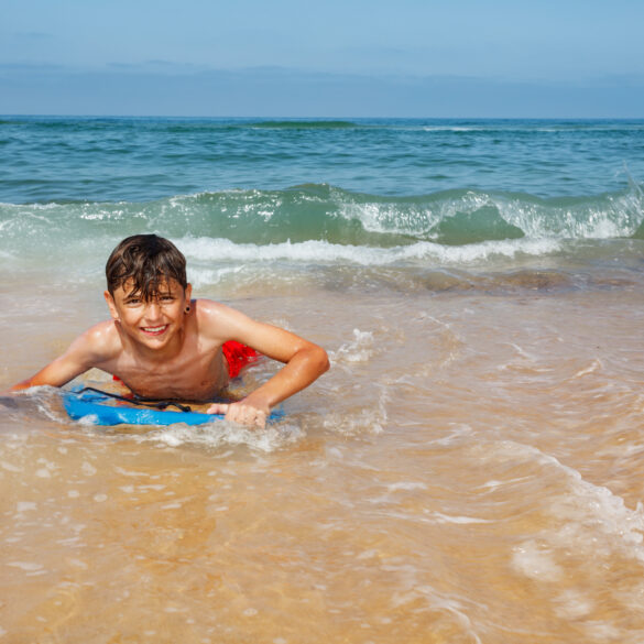 Toms river offers summer paddleboarding and bodyboarding camps for kids - photo licensed by shore news network.