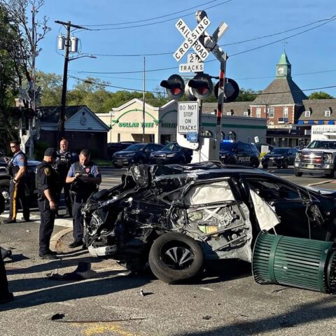 Train slams car at new jersey railroad crossing, driver able to walk away - photo licensed by shore news network.