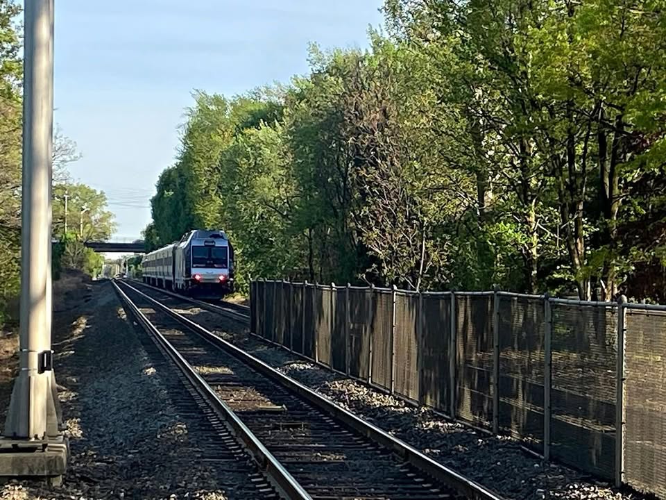 Train slams car at New Jersey railroad crossing, driver able to walk away