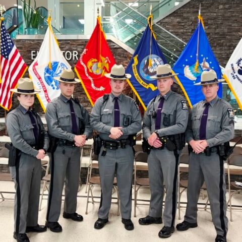 New york state troopers welcome veterans home from honor flight at syracuse airport - photo licensed by shore news network.