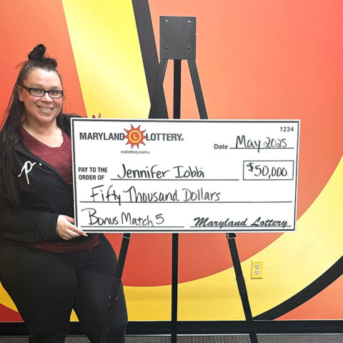 Parkville supermarket worker claims $50,000 maryland lottery prize - photo licensed by shore news network.