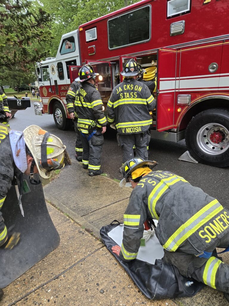 Firefighters use airbag tool to free dog stuck under shed in jackson - photo licensed by shore news network.