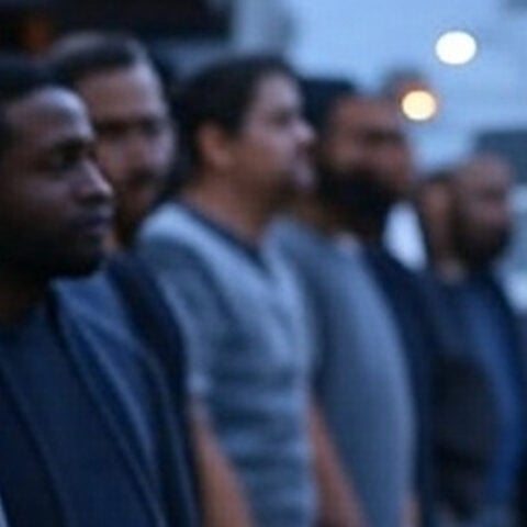 Artist's rendering of a homeless campus - men waiting for a bus to downtown toms river