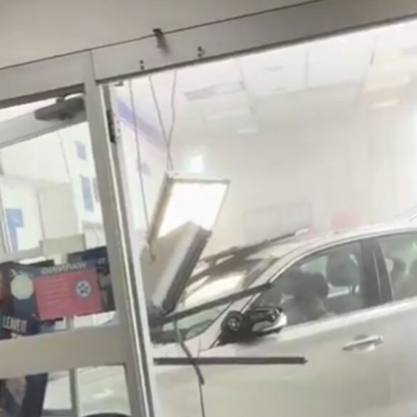 Car crashes into middletown post office after driver mistakes gas for brake - photo licensed by shore news network.