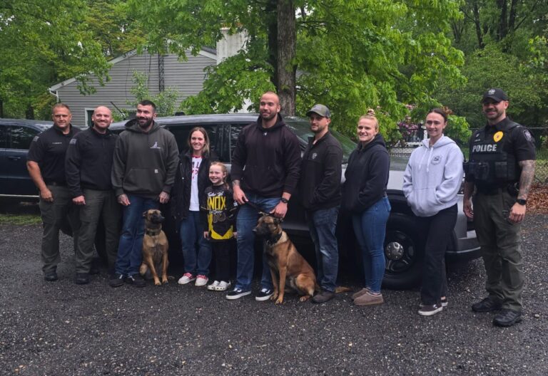 Police officers, k9 units visit young jersey girl after father's passing - photo licensed by shore news network.