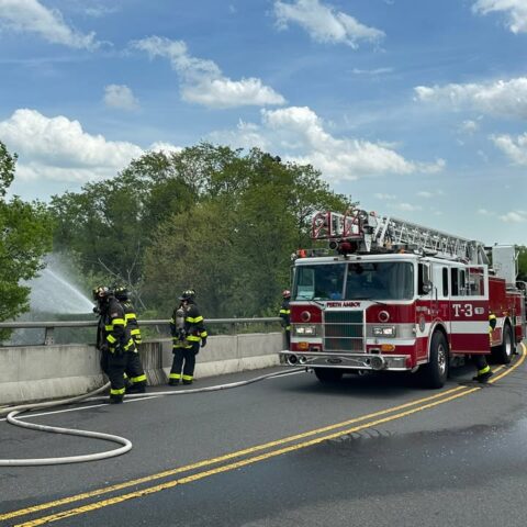 Wind-driven brush fire burns along riverview drive in perth amboy - photo licensed by shore news network.