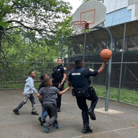 Cops slam-dunk community spirit at doyle park in yonkers - photo licensed by shore news network.