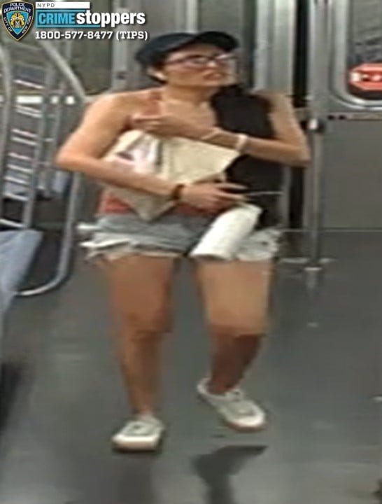 Woman struck with metal bottle during dispute on southbound D train at 59 Street station