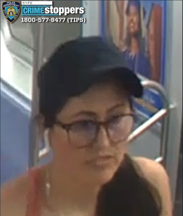 Woman struck with metal bottle during dispute on southbound D train at 59 Street station