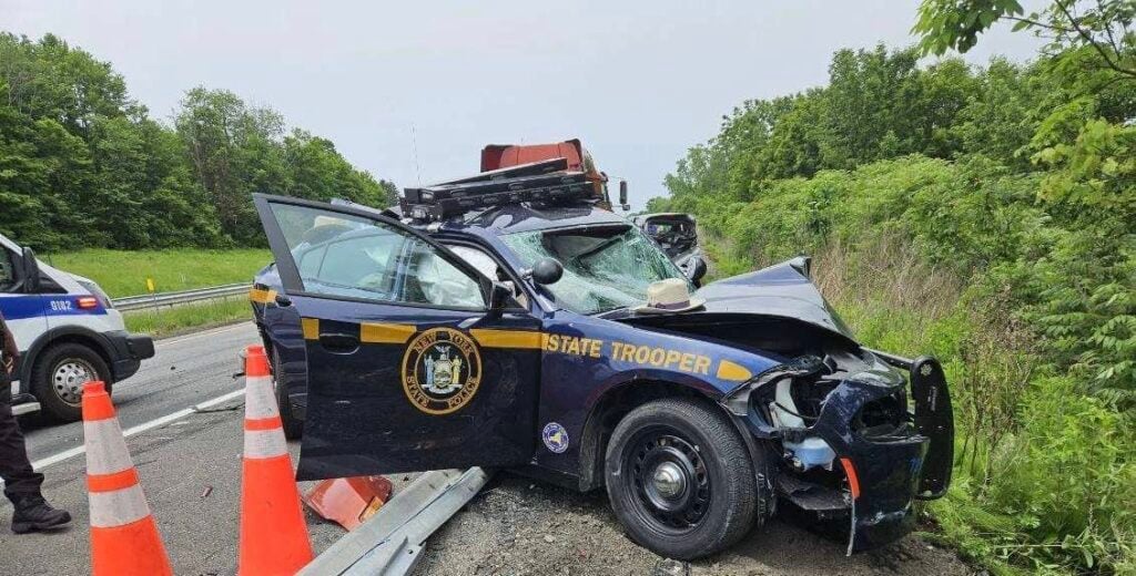 State Trooper injured after semi-truck slams patrol car during Thruway traffic stop State Trooper injured after semi-truck slams patrol car during Thruway traffic stop