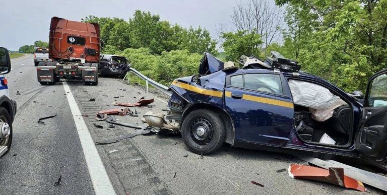 State trooper injured after semi-truck slams patrol car during thruway traffic stop - photo licensed by shore news network.