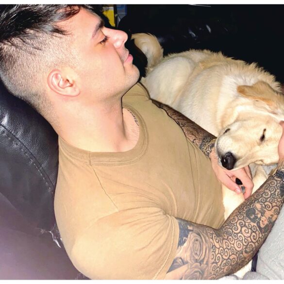 New jersey sailor reuinited with his dog archie after returning home from combat deployment - photo licensed by shore news network.