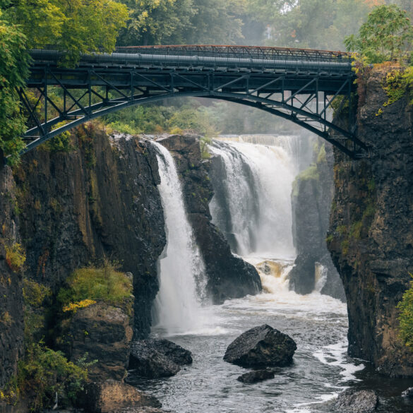 Kayaker exposes new jersey's polluted passaic river enroute to paterson's great falls - photo licensed by shore news network.