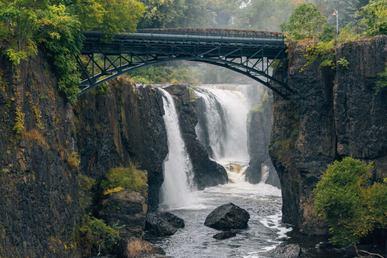 Kayaker exposes new jersey's polluted passaic river enroute to paterson's great falls - photo licensed by shore news network.
