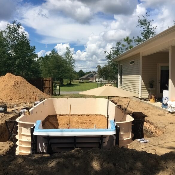 Unlicensed contractor charged with forging permit for suffolk county pool project - photo licensed by shore news network.