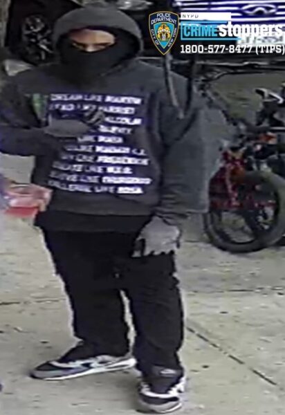 Man robbed at gunpoint inside queens business, suspect at large - photo licensed by shore news network.