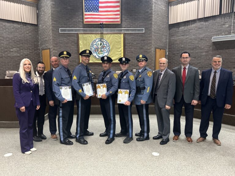 Jackson police department announces promotions at township council meeting - photo licensed by shore news network.