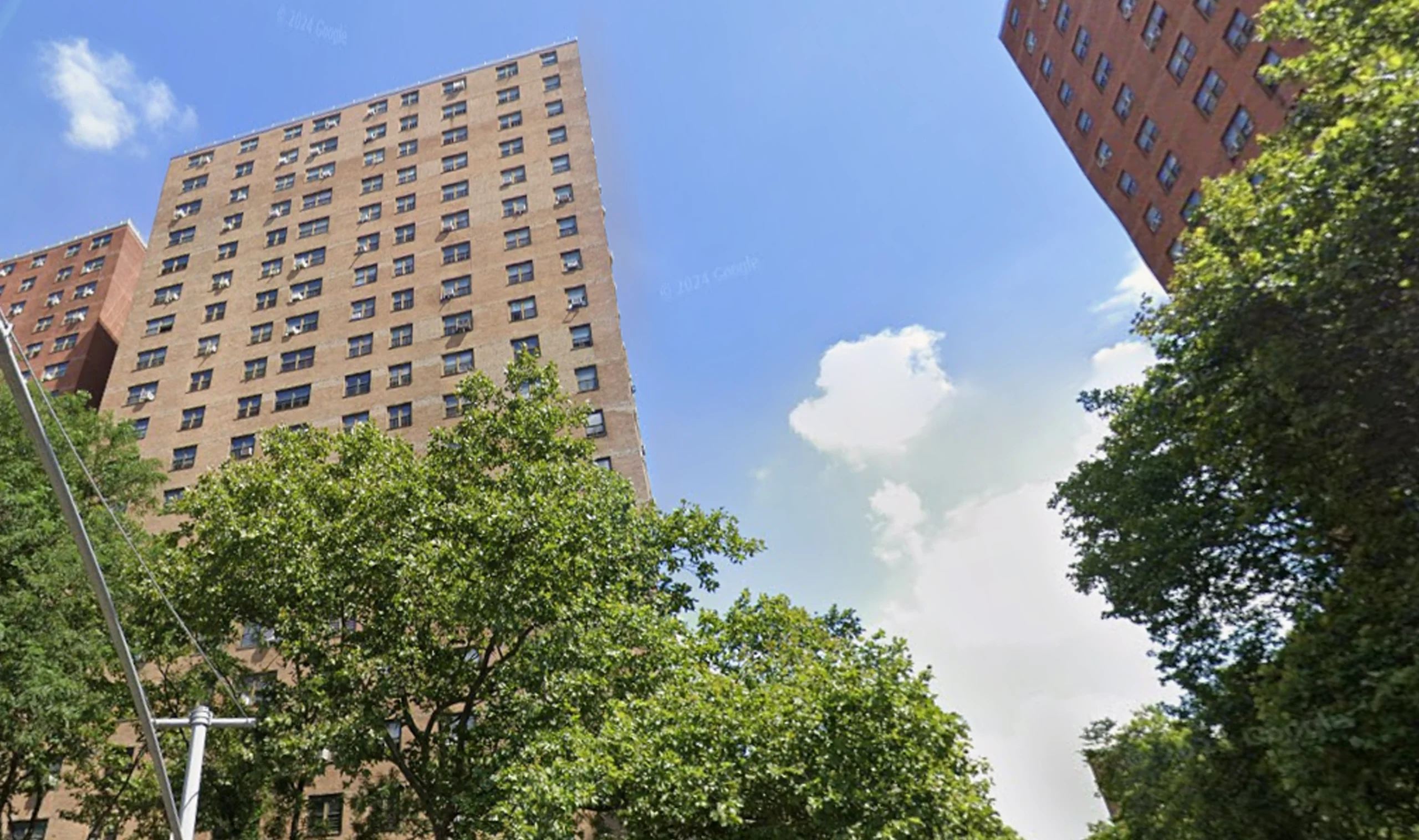 Man killed, woman injured in Harlem shooting behind 8th Avenue building