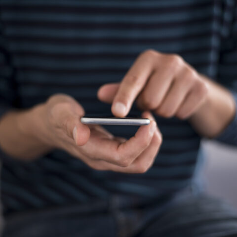 Man texting - file photo