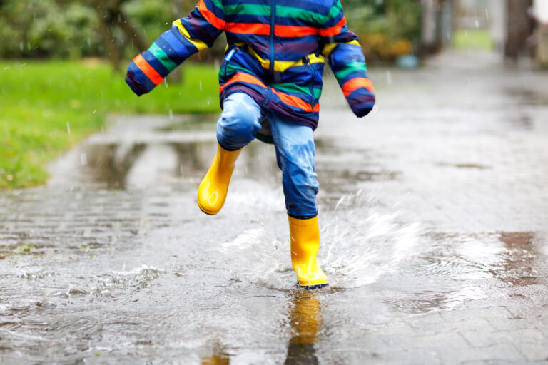 A child playing in the rain - file photo