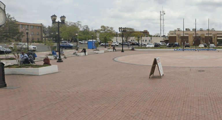 Body found in port-a-potty at lakewood downtown square prompts police investigation - photo licensed by shore news network.