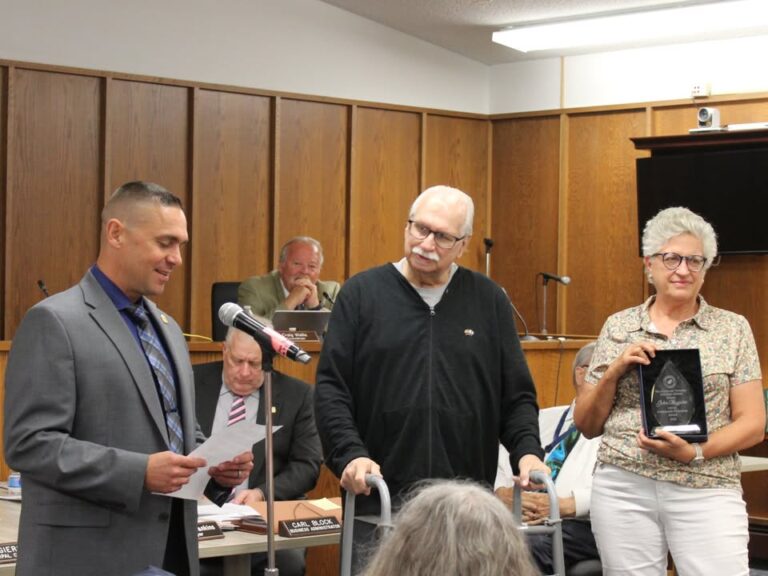 Manchester police honor john mcguire with community champion award - photo licensed by shore news network.