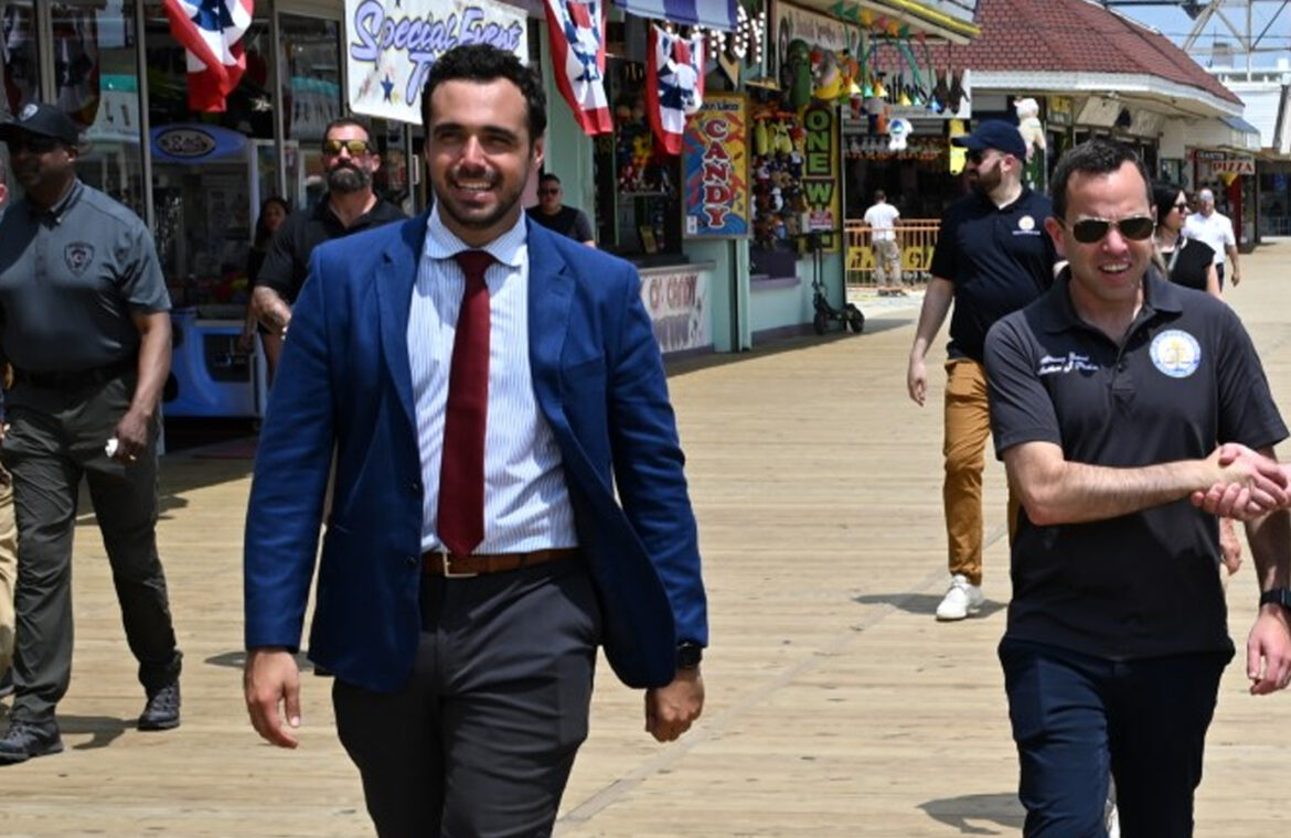 NJ Attorney General being escorted on the Seaside Heights Police Department with Ocean County Commissioner Robert Arace.