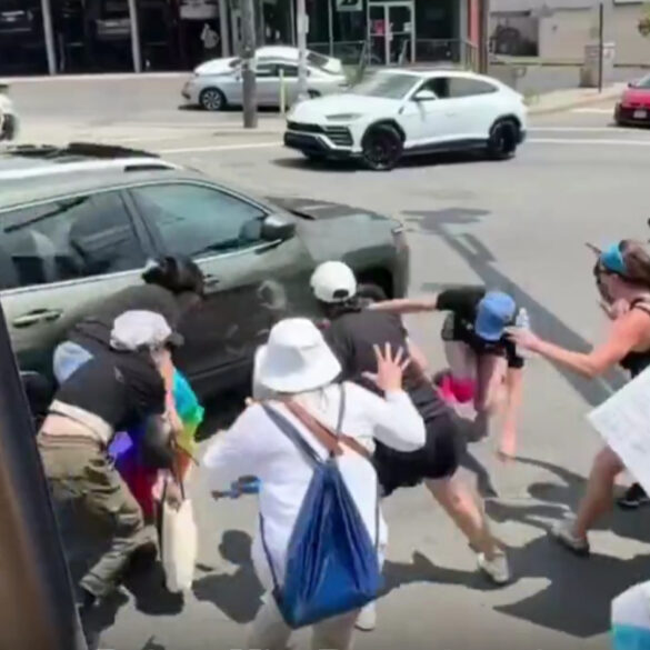 Watch: new jersey woman charged after driving through protest crowd in fairview - photo licensed by shore news network.