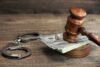Gavel in courtroom - Handcuffs