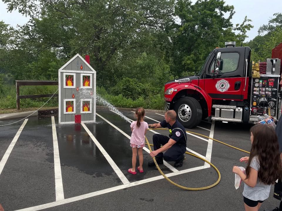 Crowds pack Monroe Township for National Night Out filled with music cars and community spirit