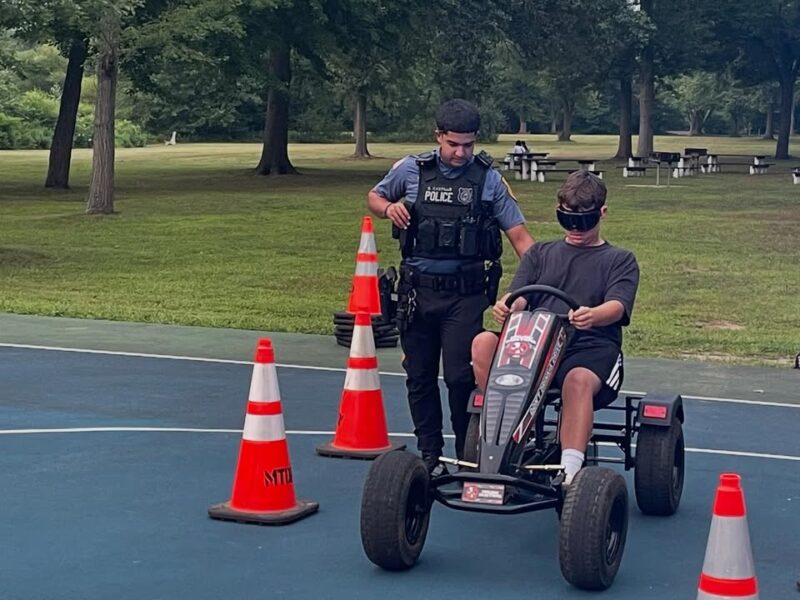Crowds pack Monroe Township for National Night Out filled with music cars and community spirit
