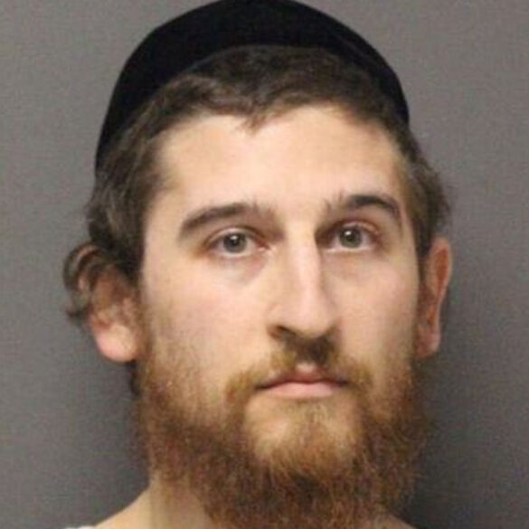 Lakewood father charged after toddler found locked in hot car outside police station - photo licensed by shore news network.