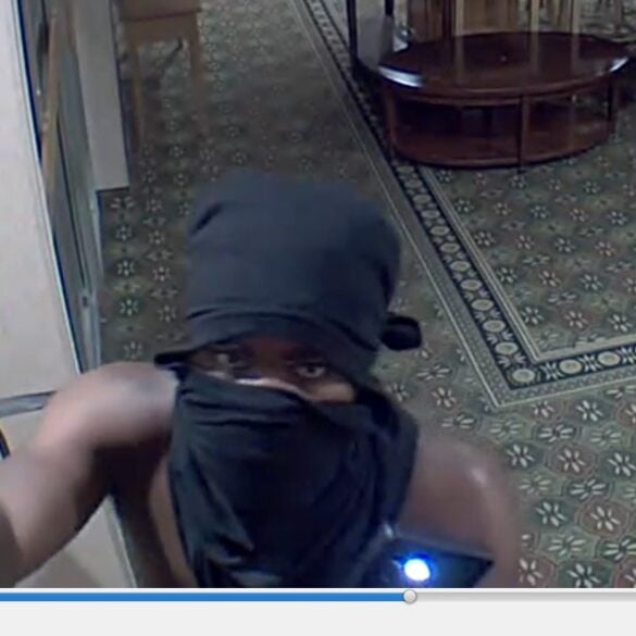Shirtless man and woman break into former ithaca hotel - photo licensed by shore news network.