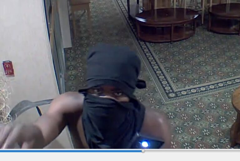 Shirtless man and woman break into former ithaca hotel - photo licensed by shore news network.
