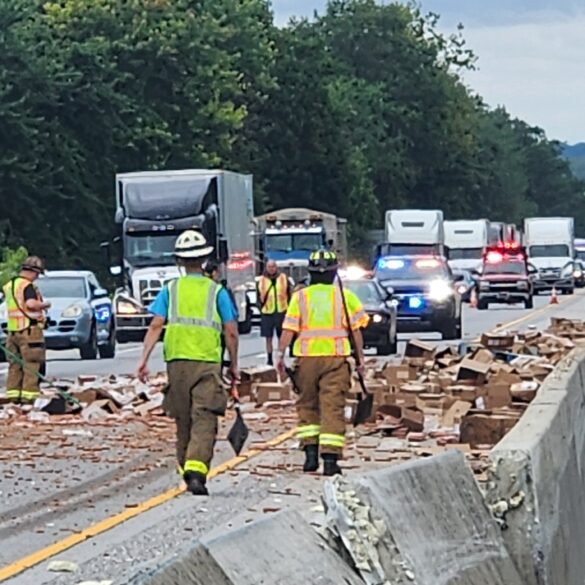 Tractor-trailer crash spills 1,000 pounds of hot dogs on highway, injuring four people - photo licensed by shore news network.
