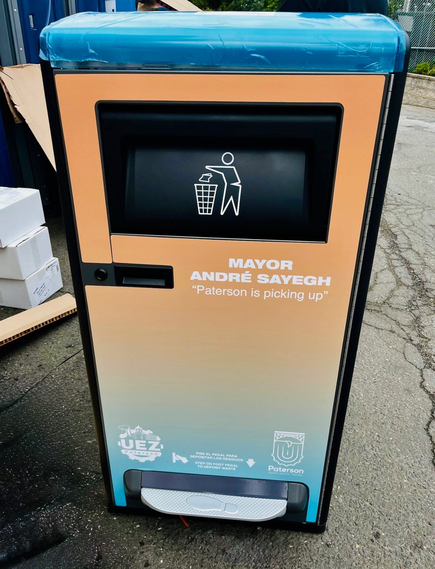Paterson is a city in chaos, but it now has solar powered smart garbage bins complete with Mayor's inscription