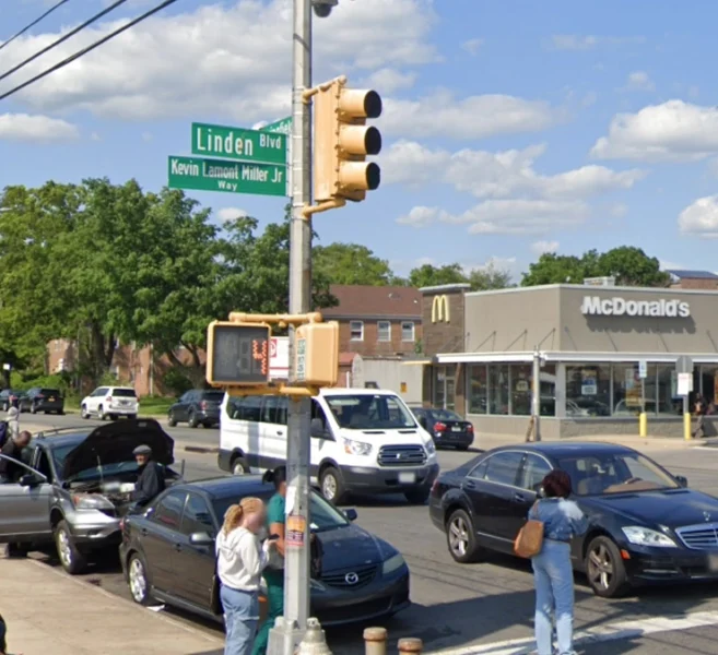 According to police, the violence erupted around 8:21 a.m. Monday outside 208-15 Linden Boulevard, when the gunman allegedly approached the young victim and opened fire, striking him in the head.