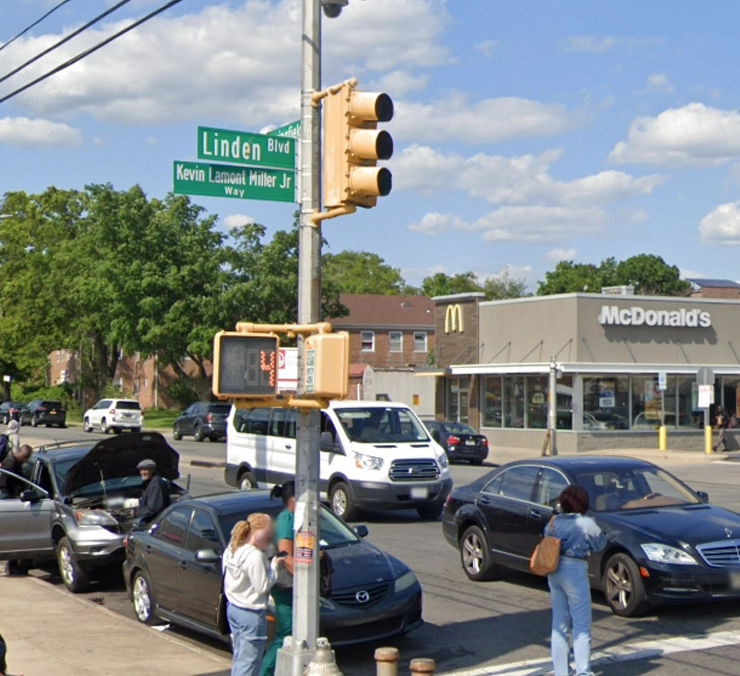 According to police, the violence erupted around 8:21 a.m. Monday outside 208-15 Linden Boulevard, when the gunman allegedly approached the young victim and opened fire, striking him in the head.